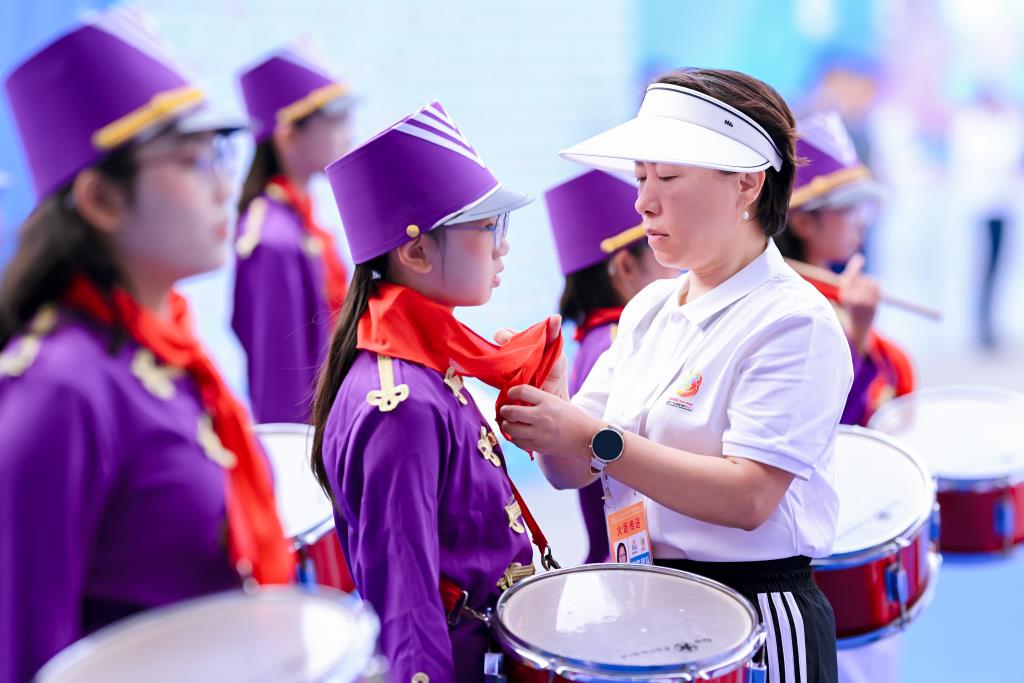 水库小学少先队鼓号队亮相第十五届全运会火炬传递深圳站收火仪式