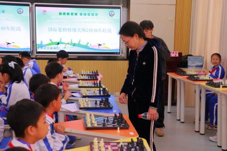 淘金山小学举行“全国国际象棋特色学校”揭牌仪式