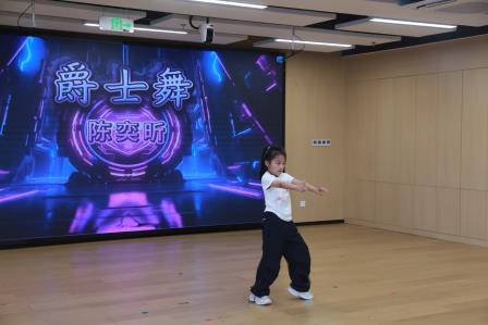 我运动 我健康 我快乐—— 布心小学开展七色花之“橙色花”主题升旗仪式