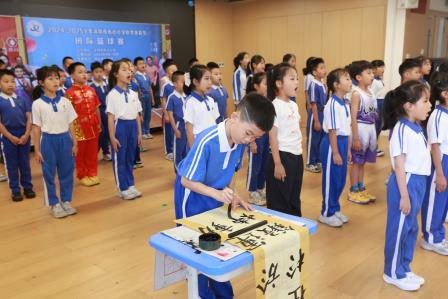 我运动 我健康 我快乐—— 布心小学开展七色花之“橙色花”主题升旗仪式