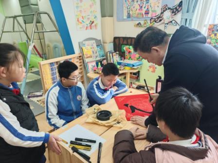 翰墨迎新春，融合暖童心——新秀小学开展融合教育主题书法活动