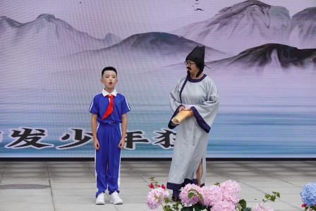 品千年经典 育少年德行——布心小学举行国学经典诵读主题升旗仪式